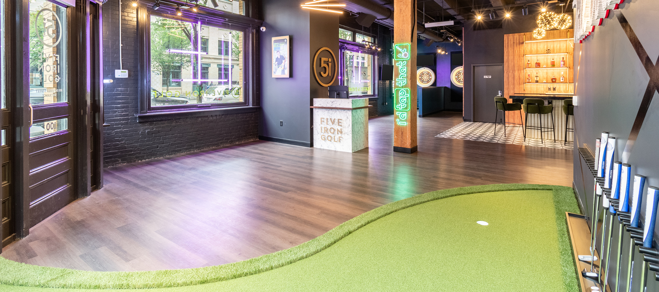 Five Iron Golf Swings Into Boston's Seaport District